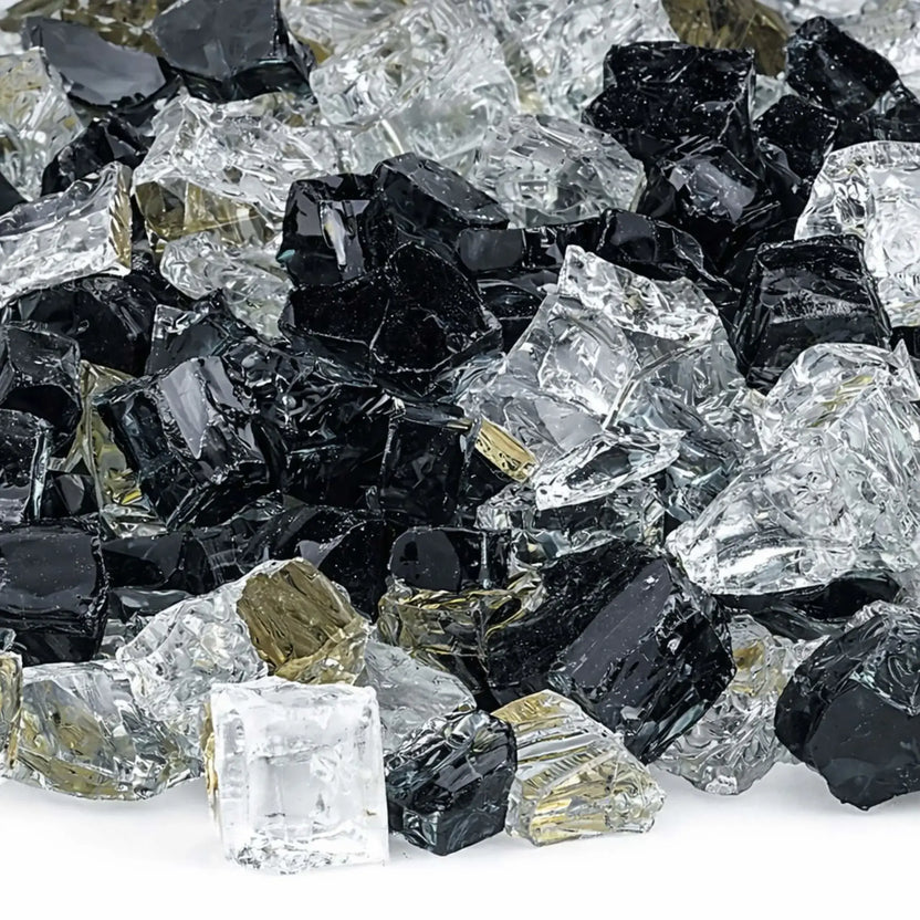 Close-up of Las Vegas 1/2 inch reflective fire glass highlighting the mix of jet black, crystal clear, and light gold tempered glass pieces with sharp, polished edges and mirrored shine.