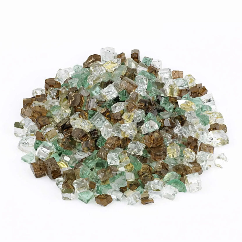 Top-down view of Yosemite pre-mix 1/2 inch reflective tempered fire glass arranged in a rounded pile, showcasing the evenly distributed mix of green, amber, gold, and clear tones.