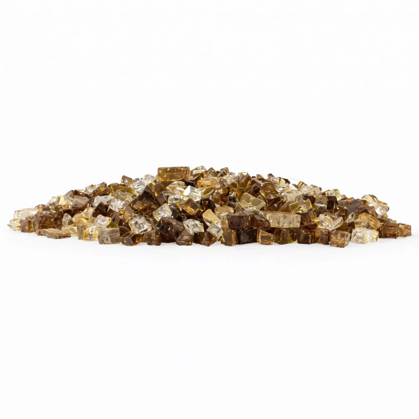 Low-profile mound of Zion pre-mix 1/2 inch reflective tempered fire glass combining rich bronze brown, warm honey gold, and clear pieces for a layered, high-contrast fire pit media look.