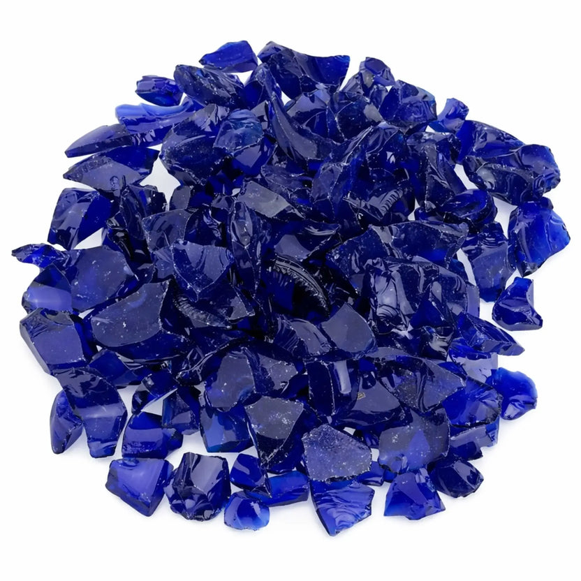Overhead view of dark blue tempered recycled fire glass from American Fire Products, showing a dense pile of deep cobalt shards with glossy, reflective surfaces and varied angular shapes.