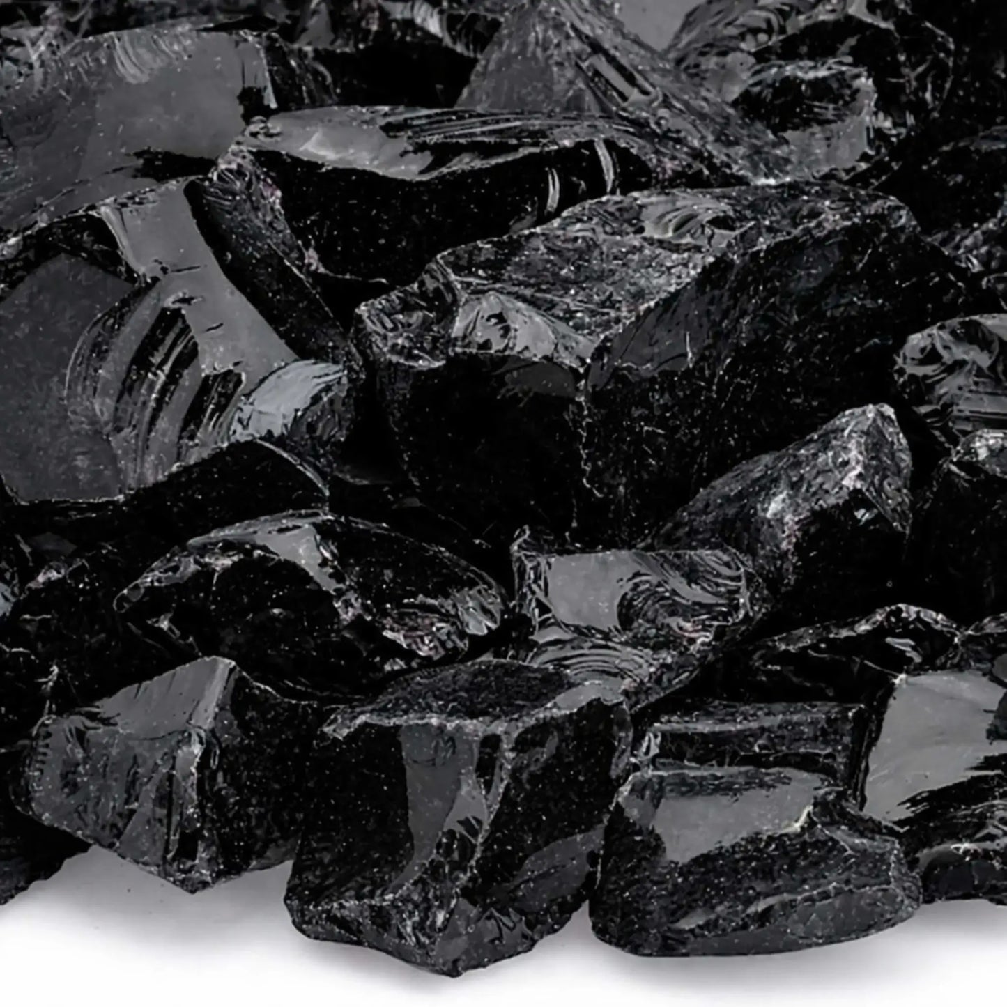 Close-up of Onyx Black fire glass highlighting smooth, tempered edges, mirror-like shine, and subtle texture variations across the dark, angular pieces.