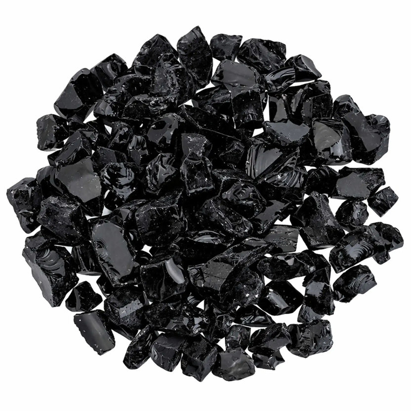 Overhead view of Onyx Black recycled fire glass in a dense circular arrangement, showcasing glossy black shards with reflective surfaces and varied geometric shapes.