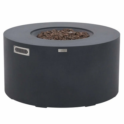 Front product image of the Elementi Art of Living Pacaya Dark Grey round GFRC concrete fire pit table with the burner cover removed. The recessed fire bowl is filled with natural lava rock media, showcasing the hidden propane burner area, circular design, stainless steel vent, and contemporary outdoor fire table styling against a white background.