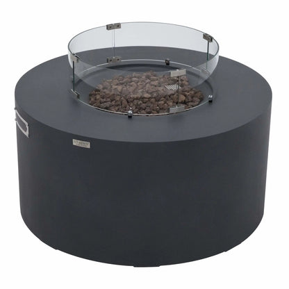 Angled product image of the Elementi Art of Living Pacaya Dark Grey round fire pit table featuring a tempered glass wind guard surrounding the lava rock burner area. The durable GFRC concrete construction, hidden propane configuration, circular fire bowl, and contemporary outdoor styling are clearly visible on a white studio background.