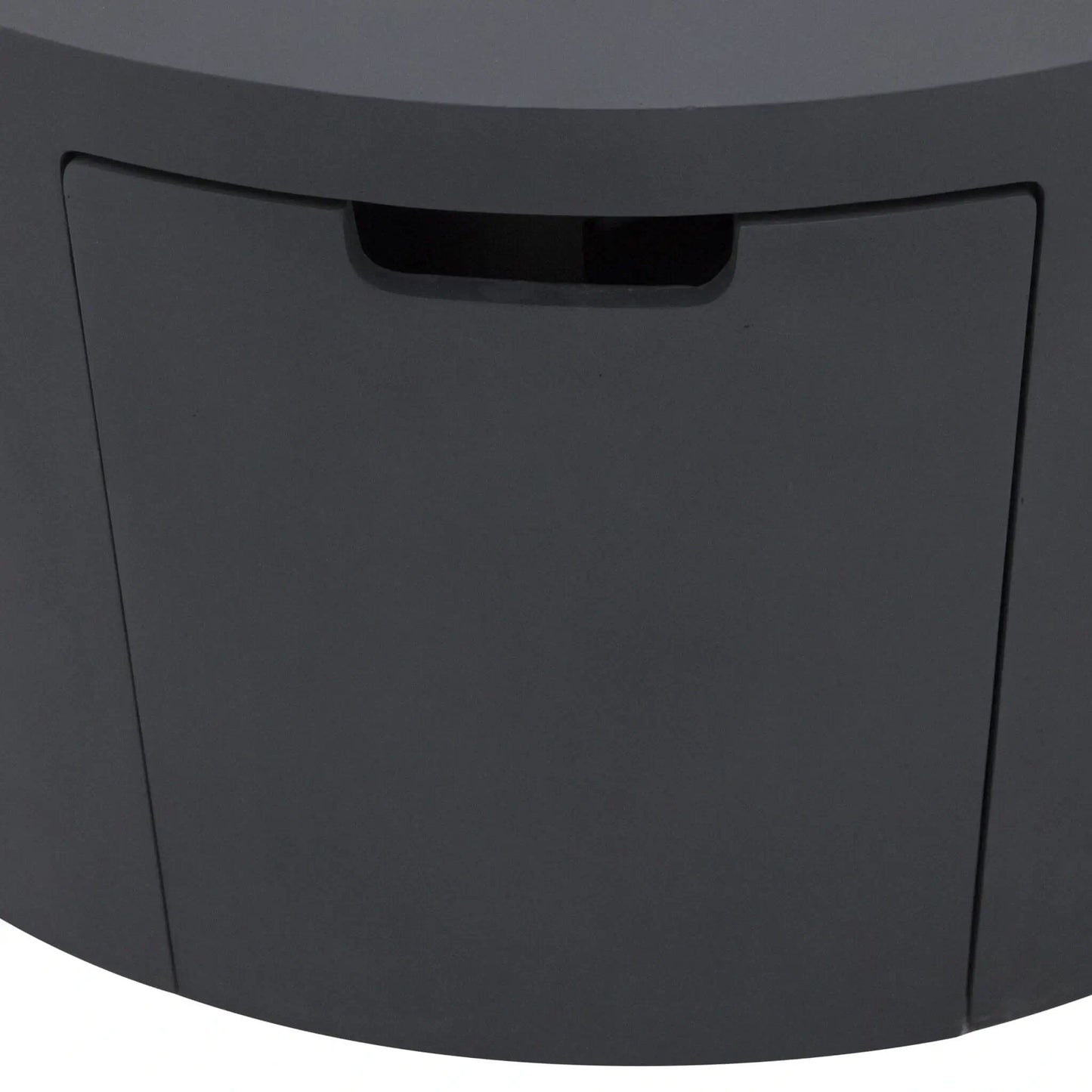 Close-up detail of the hidden drawer access panel on the Elementi Art of Living Pacaya Dark Grey fire pit table. The recessed handle opening is integrated into the curved GFRC concrete body, showcasing the concealed propane tank storage system and clean, uninterrupted appearance of this round outdoor fire pit table.