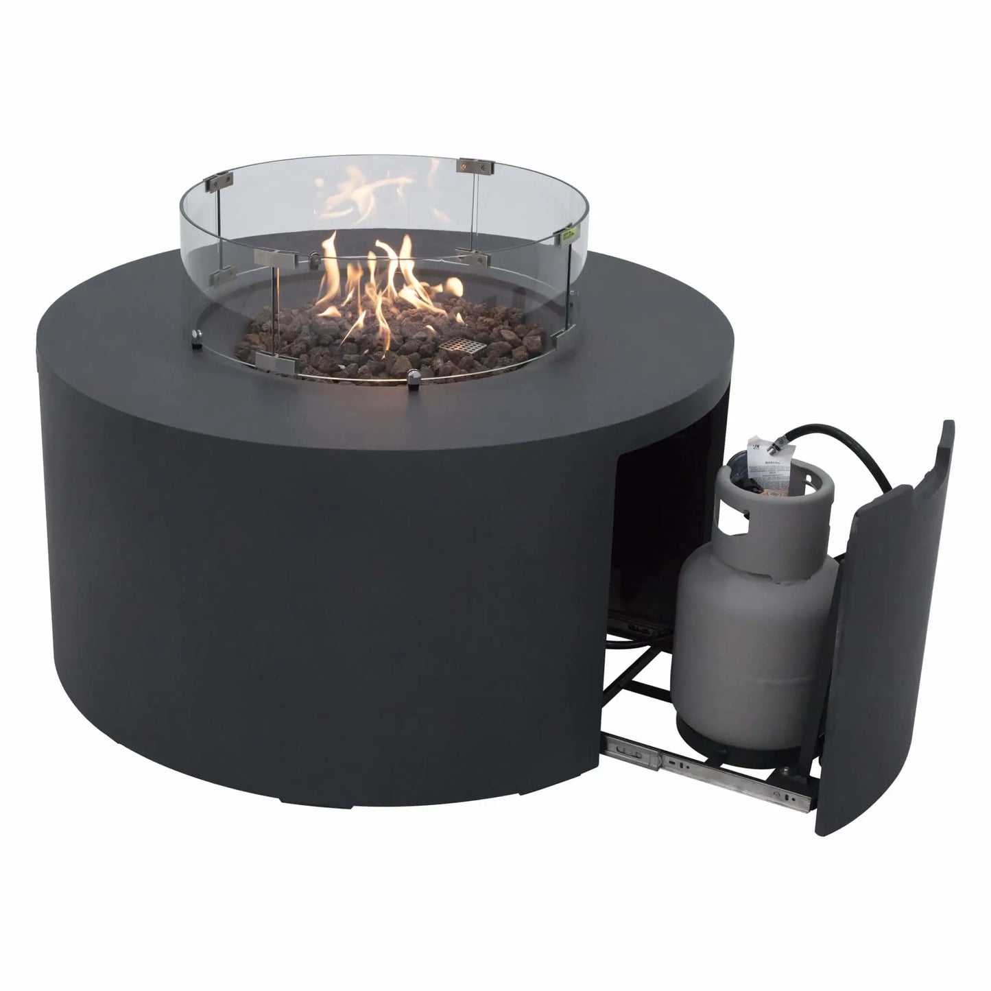 Angled view of the Elementi Art of Living Pacaya Dark Grey round fire pit table operating with active flames and a tempered glass wind guard, while the hidden propane drawer is pulled open to display the propane cylinder. This image showcases both the fire feature and concealed fuel storage system in one detailed product view.