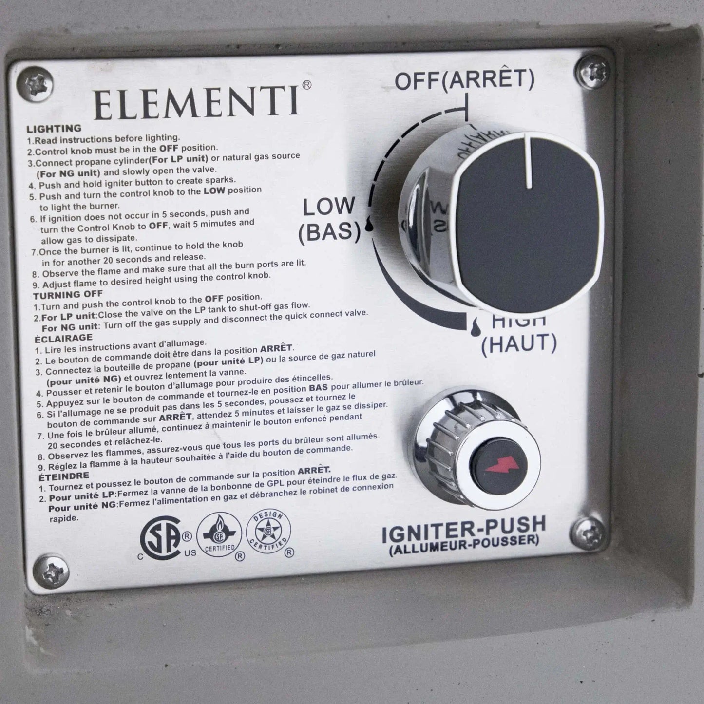 Close-up of the Elementi Art of Living fire pit control panel featuring the ignition button, flame adjustment knob, and operating instructions. Installed within the Pacaya Light Grey round GFRC concrete fire pit table, this panel provides easy control of ignition, flame height, and propane operation while maintaining a clean and professional outdoor fire feature design.