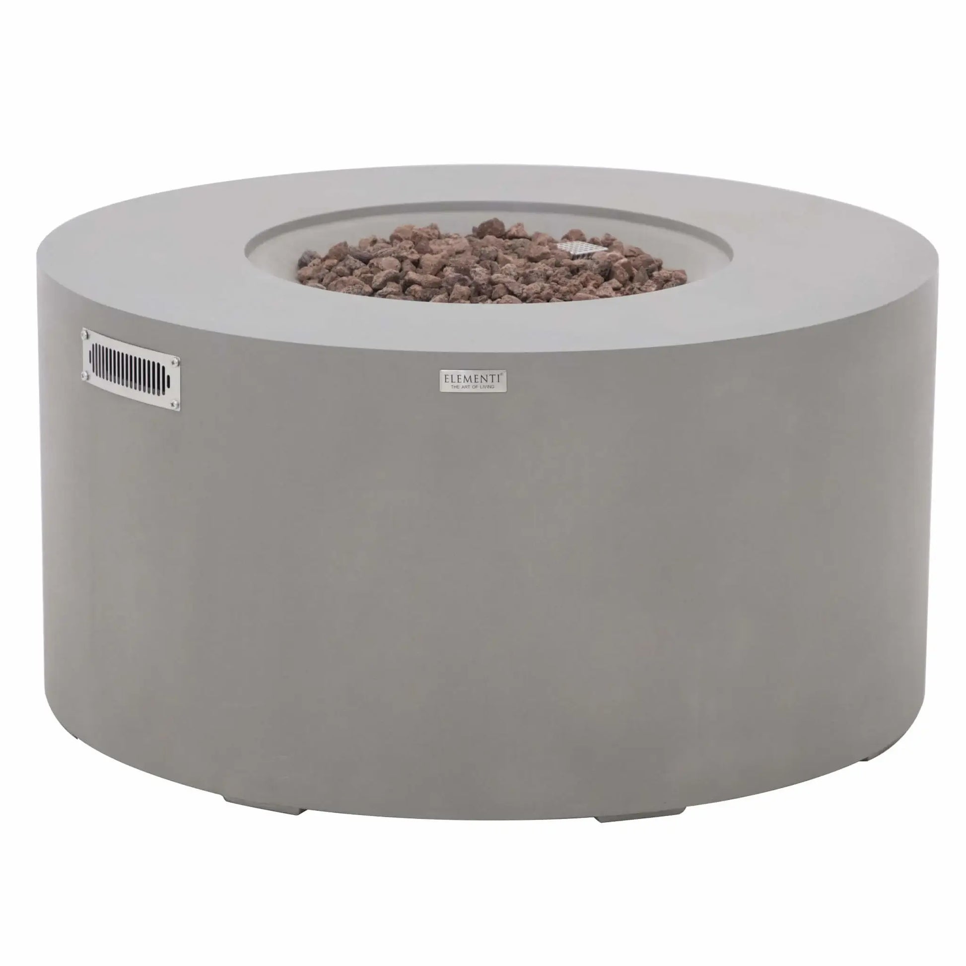Front product view of the Elementi Art of Living Pacaya Light Grey round GFRC concrete fire pit table with lava rock fire media installed. Displayed on a white background, the image highlights the circular burner basin, stainless steel ventilation panel, branded Elementi badge, and modern concrete construction designed for stylish outdoor heating and entertaining.
