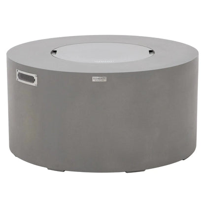 Elementi Art of Living Pacaya Light Grey round GFRC concrete fire pit table displayed with the matching burner lid installed. The image highlights the smooth circular tabletop surface, integrated burner cover, stainless steel ventilation panel, and modern outdoor furniture styling, showcasing how the fire pit converts into a functional coffee table when not in operation.