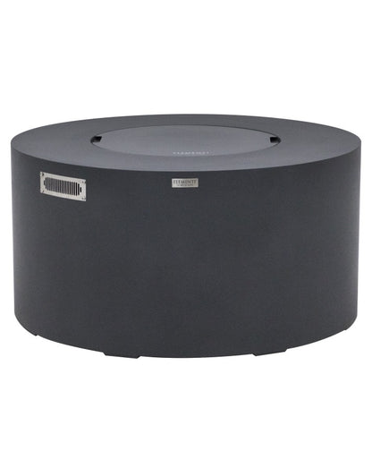 ementi Pacaya Round Fire Pit Table in dark grey GFRC concrete with a matching burner cover. This sleek and modern fire pit features a hidden propane tank design and a removable lid, allowing it to double as a functional table when not in use. The minimalist aesthetic and durable construction make it a stylish and versatile centerpiece for any outdoor space.