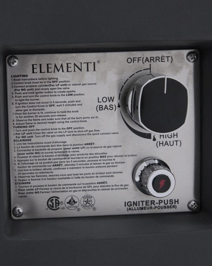Close-up of the Elementi Pacaya Round Fire Pit Table’s control panel, featuring a stainless steel ignition system with an easy-to-use control knob and push-button igniter. The panel includes detailed lighting and safety instructions in English and French, ensuring a seamless and safe fire-starting experience. Certified for quality and safety, this sleek and functional design enhances the convenience of outdoor heating.