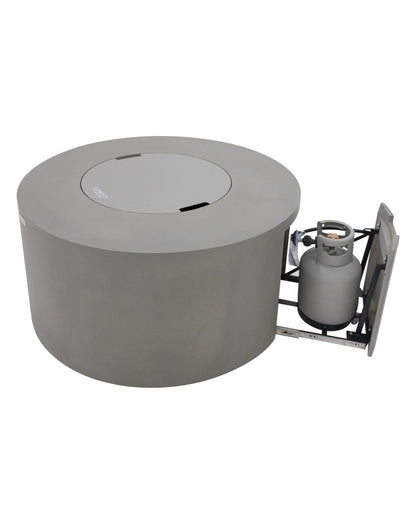 Elementi Pacaya Round Hidden Propane Tank Fire Pit Table in light grey GFRC concrete, featuring a sleek burner cover and a discreet pull-out drawer for seamless propane tank storage, blending modern aesthetics with practical functionality.