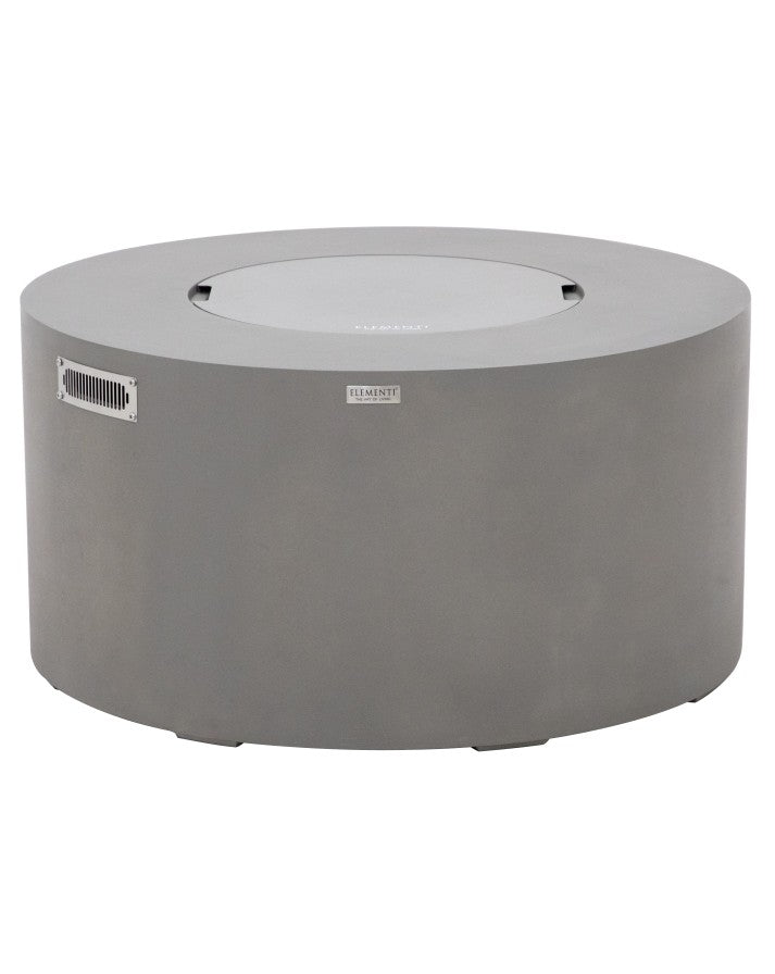 Elementi Pacaya Round Hidden Propane Tank Fire Pit Table in light grey GFRC concrete, featuring a sleek burner cover for a seamless, modern design that transforms the fire pit into a functional outdoor table.