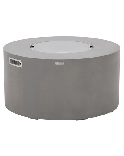 Elementi Pacaya Round Hidden Propane Tank Fire Pit Table in light grey GFRC concrete, featuring a sleek burner cover for a seamless, modern design that transforms the fire pit into a functional outdoor table.