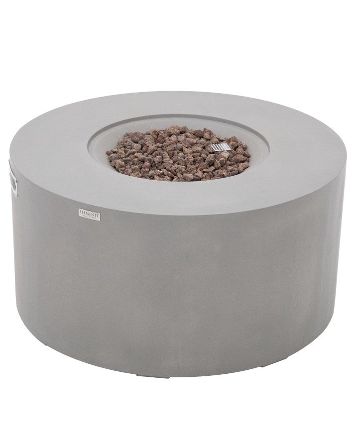 Elementi Pacaya Round Hidden Propane Tank Fire Pit Table in light grey GFRC concrete, elegantly designed with natural lava rocks for a rustic yet modern appeal. This premium fire feature offers both warmth and style, making it a perfect centerpiece for any outdoor space.