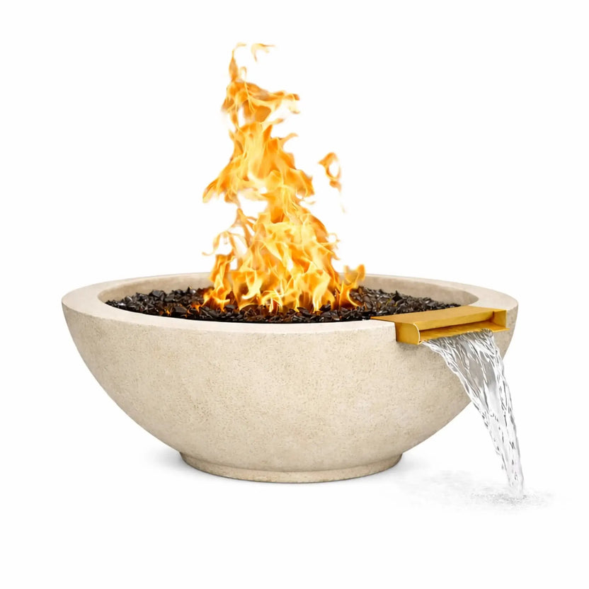 White round concrete fire and water bowl with a natural stone-like finish, showcasing an active gas flame burning over black fire media while water flows steadily from a bronze spillway, isolated on a white background for product detail visibility.