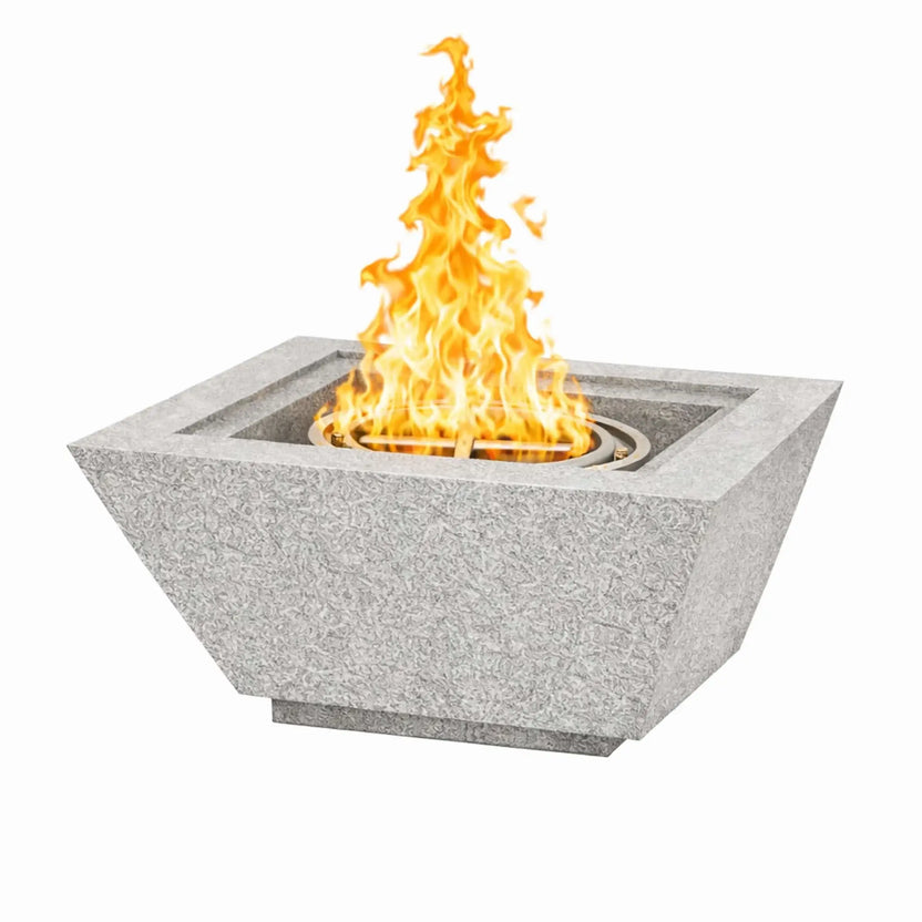 Gray Flame Havens 30 inch square angular fire bowl with fire burning, highlighting the textured concrete finish and bold geometric shape designed for contemporary outdoor living spaces.
