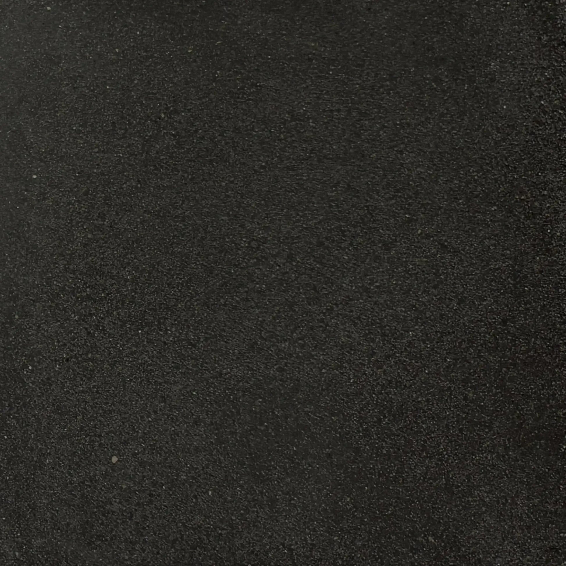 Full-size black GFRC concrete finish sample by Flame Havens, highlighting the rich dark tone and subtle aggregate texture characteristic of durable glass fiber reinforced concrete fire features.