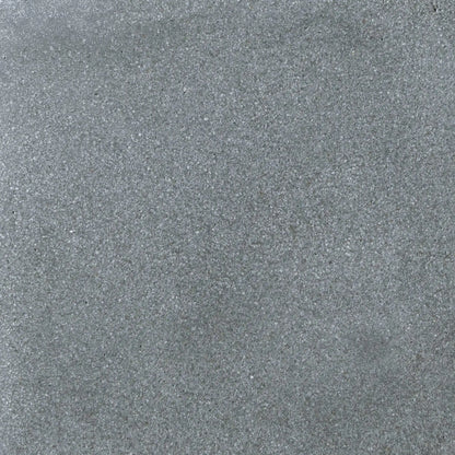 Detailed surface texture of Flame Havens Concrete GFRC Glass Fiber Reinforced Concrete Swatch Gray V4 finish. This close-up image highlights the smooth gray concrete coloration with fine speckled aggregate, soft tonal movement, and durable matte texture commonly used on GFRC concrete fire pits, outdoor fire tables, and modern patio heating products.