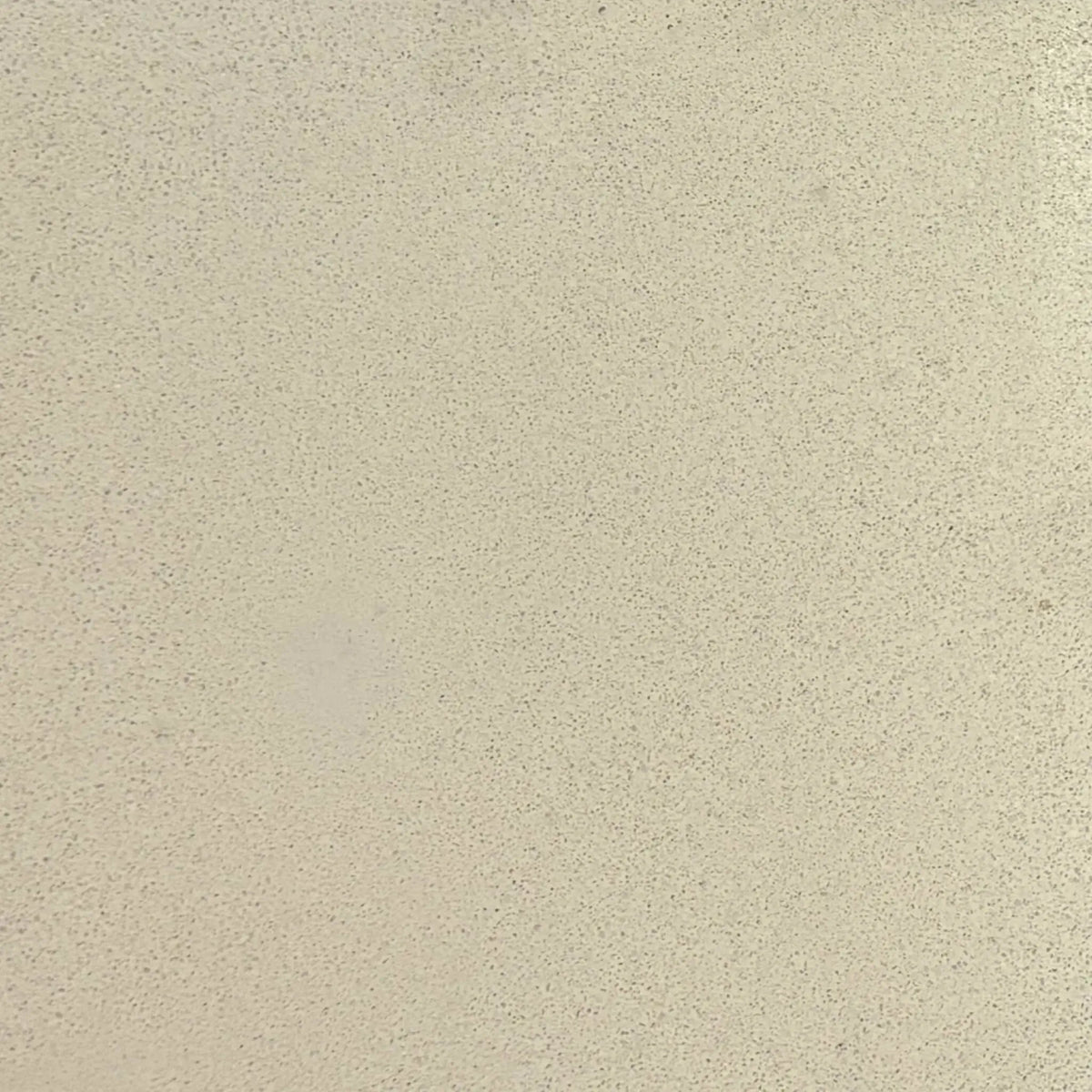 Full-size white GFRC concrete finish sample by Flame Havens, showcasing the smooth light-tone surface and refined texture of glass fiber reinforced concrete for contemporary outdoor fire features.