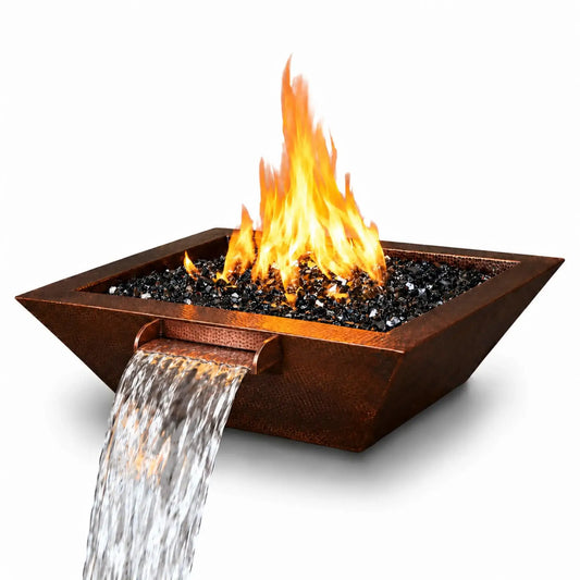Flame Havens Cabana Hammered Copper Fire & Water Bowl shown against a clean white background. The square outdoor feature has a rich hammered copper finish, broad rim, tapered walls, and reflective black fire glass with bright yellow-orange flames. A matching copper scupper projects from the front of the bowl, producing a wide, flowing sheet of water. This product image clearly displays the distinctive design and integrated fire and water functionality.