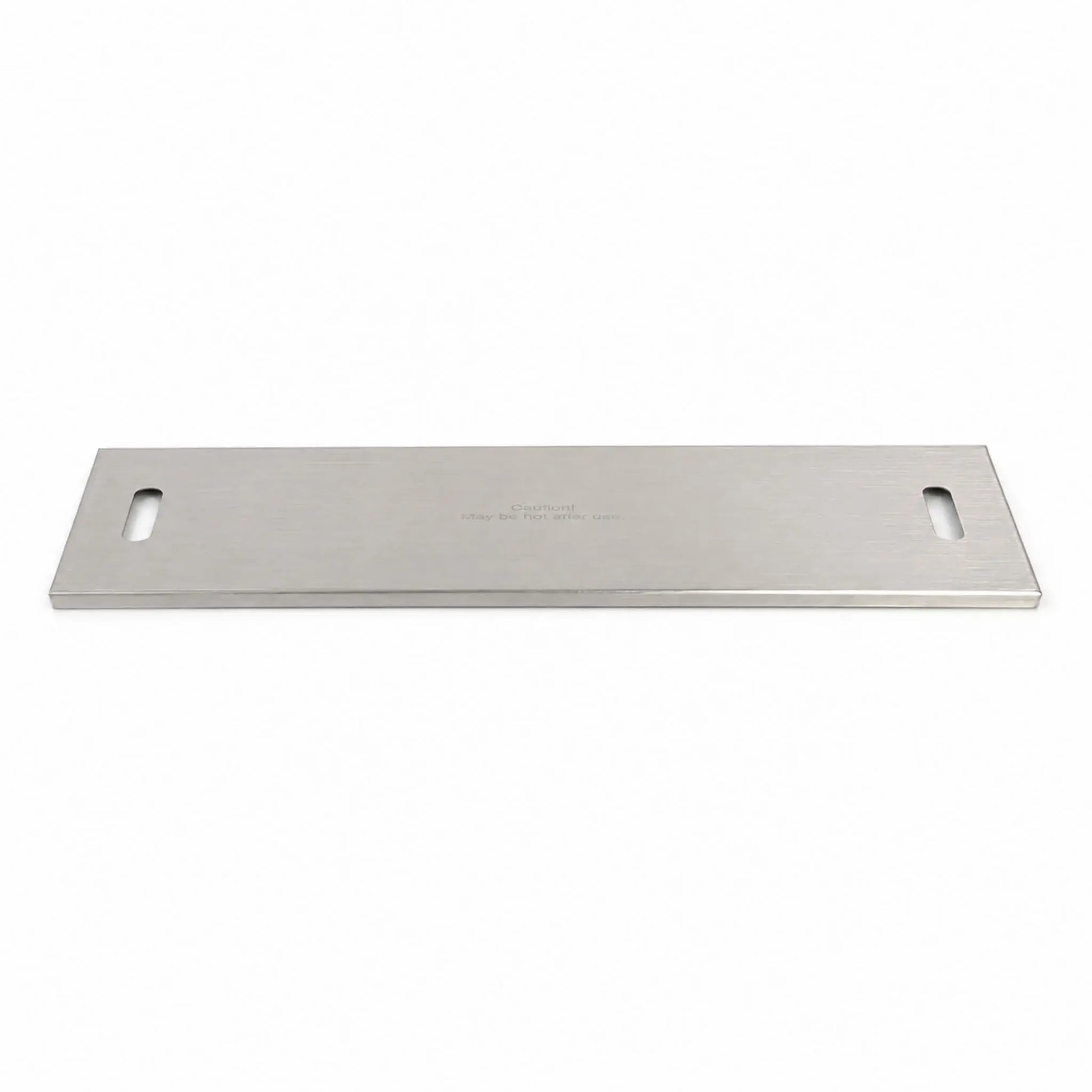 Flame Havens Refuge Series 33 x 11-inch rectangular stainless steel burner cover shown in full against a white background. The brushed metal cover features a slim, low-profile design, rounded rectangular handle openings at both ends, finished edges, and a centered caution message indicating the surface may be hot after use.