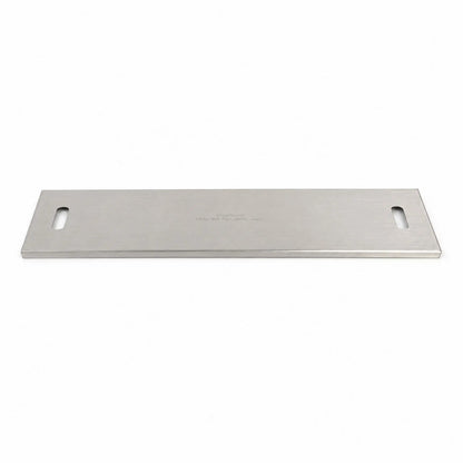 Flame Havens Refuge Series 33 x 11-inch rectangular stainless steel burner cover shown in full against a white background. The brushed metal cover features a slim, low-profile design, rounded rectangular handle openings at both ends, finished edges, and a centered caution message indicating the surface may be hot after use.