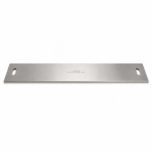 Full product view of the Flame Havens Refuge Series 45 x 11-inch rectangular stainless steel burner cover on a white background. The long, low-profile cover features a brushed metal finish, rounded rectangular handle openings at both ends, folded edges, and a centered “Caution! May be hot after use” safety message.