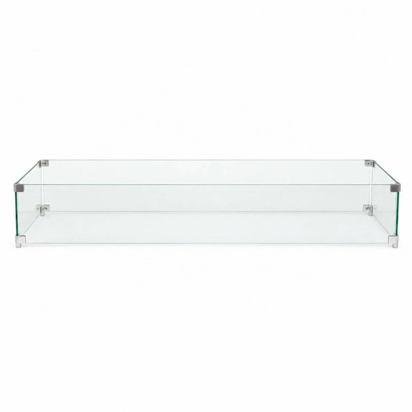 Full front view of the Flame Havens Refuge Series 48 x 14 x 7-inch rectangular tempered glass wind guard shield on a white background. Four clear glass panels form a long protective enclosure, joined by brushed stainless steel corner brackets and supported by compact metal feet at each corner.