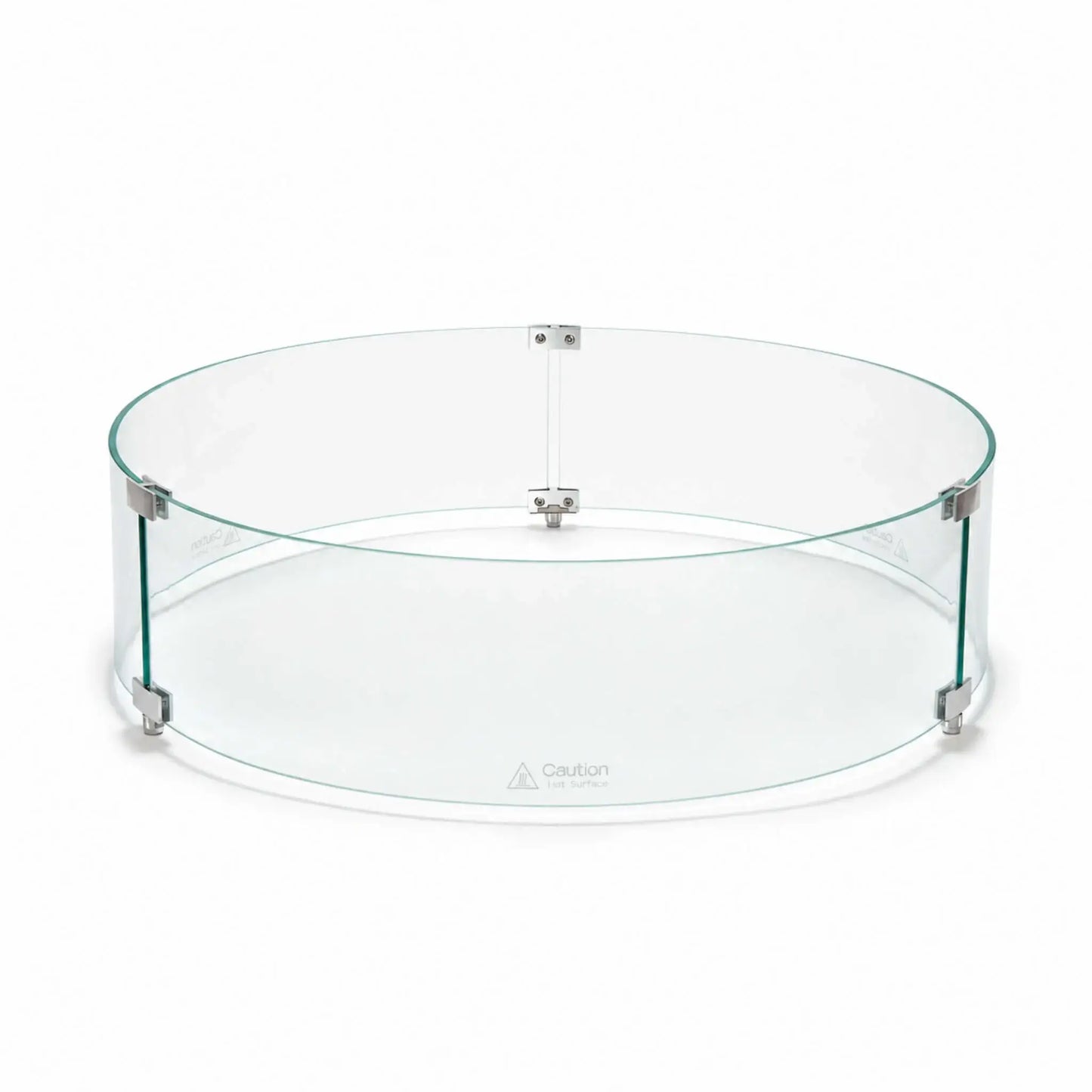 Front main view of the Flame Havens Refuge Series 28-inch round by 7-inch-tall tempered glass wind guard shield. The clear circular enclosure features green-tinted glass edges, silver panel connectors, three raised support feet, and visible hot-surface caution markings along the lower panels.