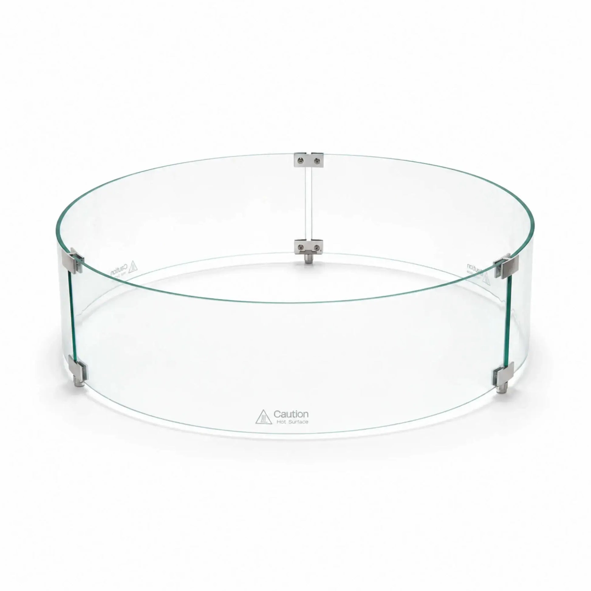 Angled main view of the assembled Flame Havens Refuge Series tempered glass wind guard shield, measuring 28 inches in diameter by 7 inches tall. Three curved clear glass panels form a complete circle, joined by silver clamps and raised support feet, with “Caution Hot Surface” warnings near the bottom.