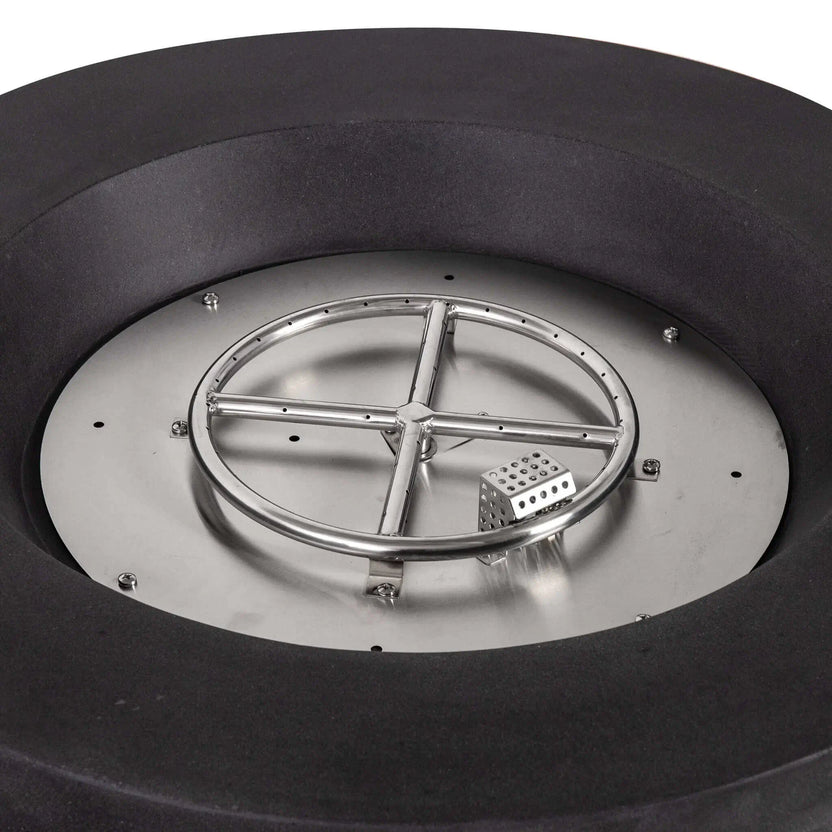Detailed view inside the Flame Havens Refuge Series 36-inch Round Natural Gas GFRC Concrete Fire Pit showing the stainless steel circular burner, CSA-certified ignition assembly, and precision-engineered burner plate. The close-up highlights the durable stainless steel construction designed for reliable outdoor performance and even flame distribution.