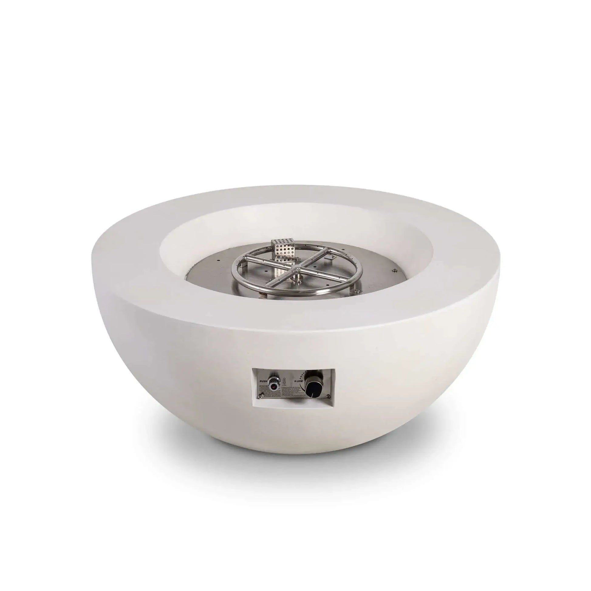 Front product image of the Flame Havens Refuge Series 36-inch Round Natural Gas White GFRC Concrete Fire Pit featuring the exposed stainless steel burner, CSA-certified ignition system, and integrated control panel. The image highlights the precision-engineered burner assembly before fire glass is installed, emphasizing premium craftsmanship and dependable outdoor performance.