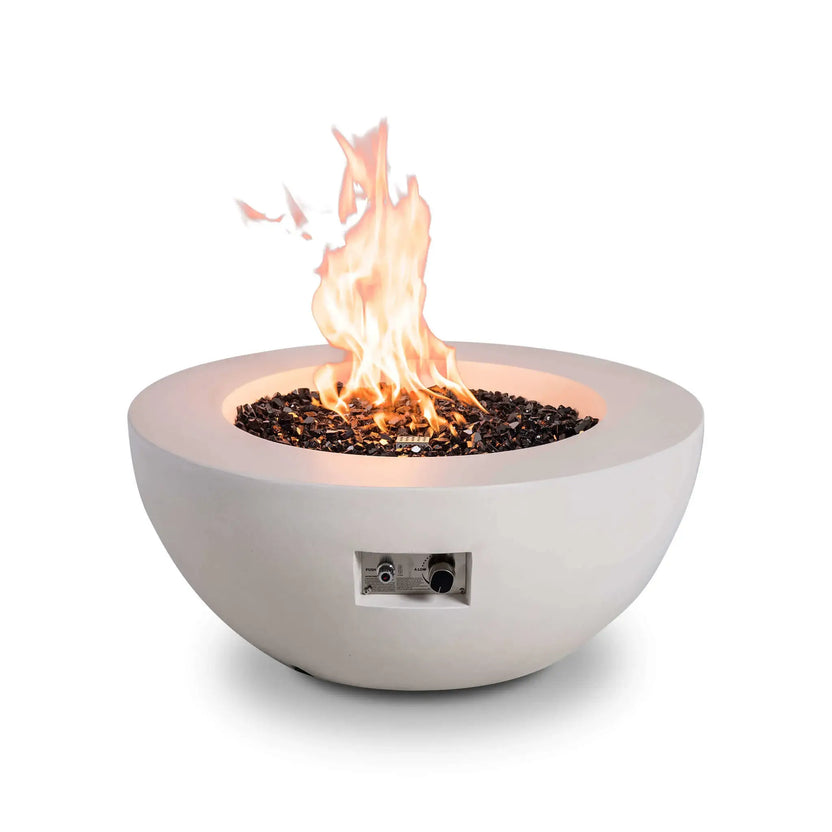 Front studio view of the Flame Havens Refuge Series 36-inch Round Natural Gas White GFRC Concrete Fire Pit in operation. Tall natural gas flames rise from premium black reflective tempered fire glass, while the integrated recessed control panel and smooth white GFRC concrete construction emphasize the fire pit's premium craftsmanship and modern outdoor design.