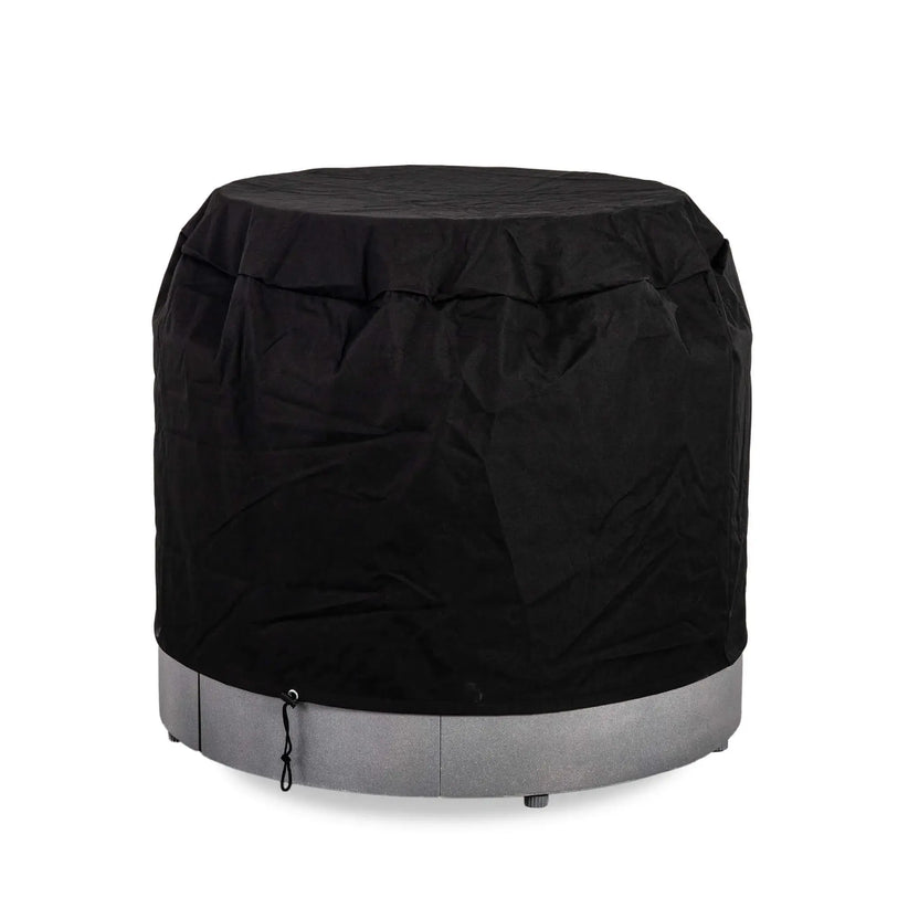Flame Havens Refuge Series 36-inch Round Propane Gas GFRC Concrete Fire Pit shown with the optional Black Canvas Fabric Cover installed over the tempered glass wind guard. The fitted weather-resistant cover protects both the Graphite Black GFRC fire pit and glass wind guard from rain, dust, and debris while preserving the premium outdoor finish.