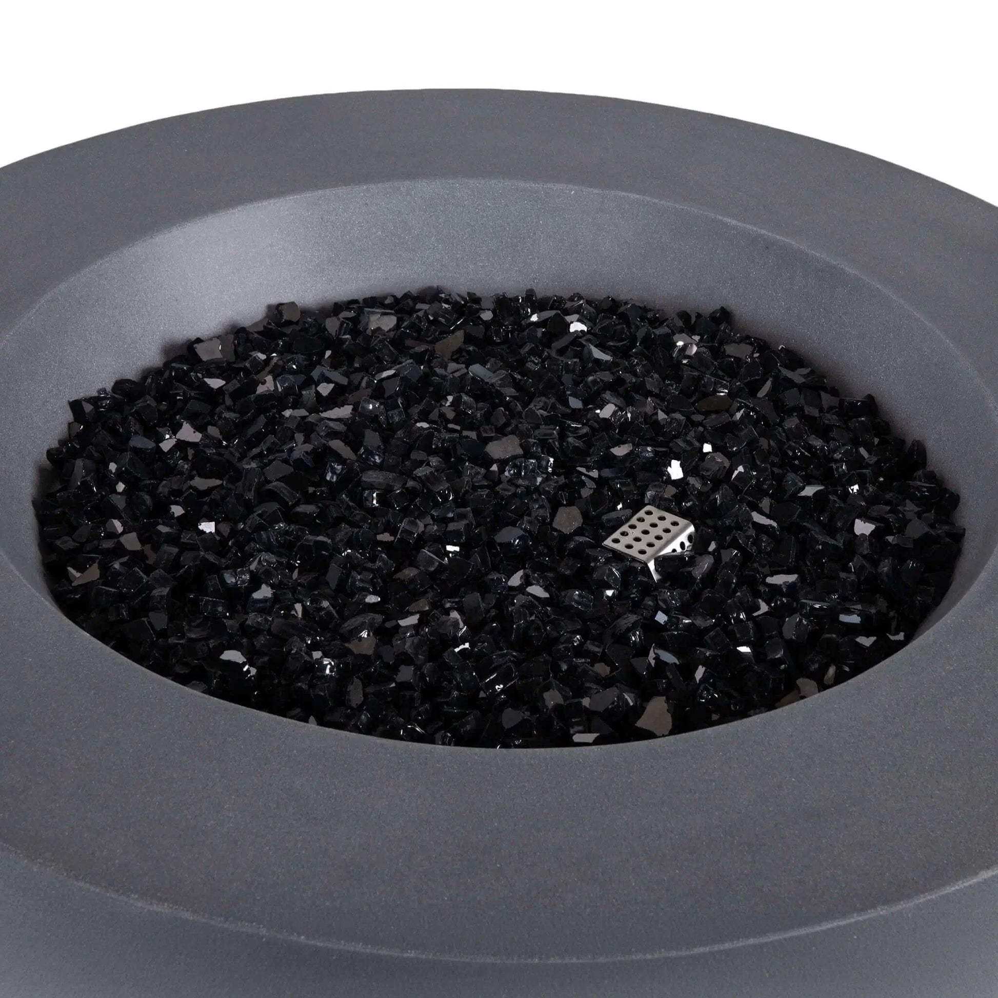 Close-up of the Flame Havens Refuge Series 36-inch Round Propane Gas GFRC Concrete Fire Pit in Natural Gray featuring premium Black Reflective Fire Glass with the burner off. The image showcases the smooth GFRC concrete finish, generous burner basin, and stainless steel ignitor housing concealed beneath the decorative fire glass for a refined contemporary appearance.