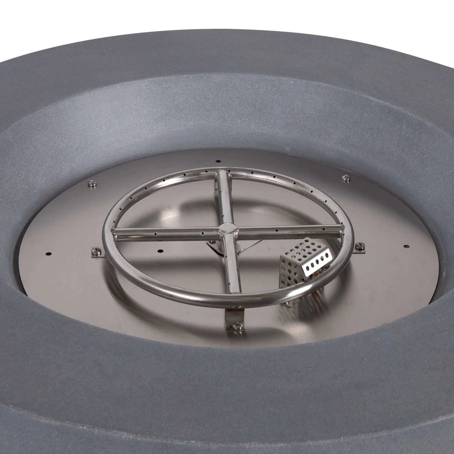Close-up of the Flame Havens Refuge Series 36-inch Round Propane Gas GFRC Concrete Fire Pit burner assembly showing the stainless steel circular burner ring, CSA-certified ignition system, and stainless burner pan before decorative Black Reflective Fire Glass is installed. The image highlights the quality construction and precision-engineered burner components.