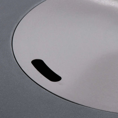 Close-up of the optional stainless steel burner cover installed on the Flame Havens Refuge Series 36-inch Round Propane Gas GFRC Concrete Fire Pit in Natural Gray. The precision-fit cover creates a smooth tabletop surface while protecting the burner and fire glass when the fire pit is not in use, adding both functionality and modern style.
