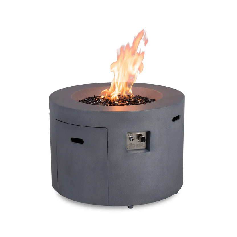 Front view of the Flame Havens Refuge Series 36-inch Round Propane Gas GFRC Concrete Fire Pit in Natural Gray operating with tall propane flames over premium Black Reflective Fire Glass. The image highlights the hidden propane drawer, recessed CSA-certified ignition controls, and durable GFRC concrete construction designed for premium outdoor living spaces.