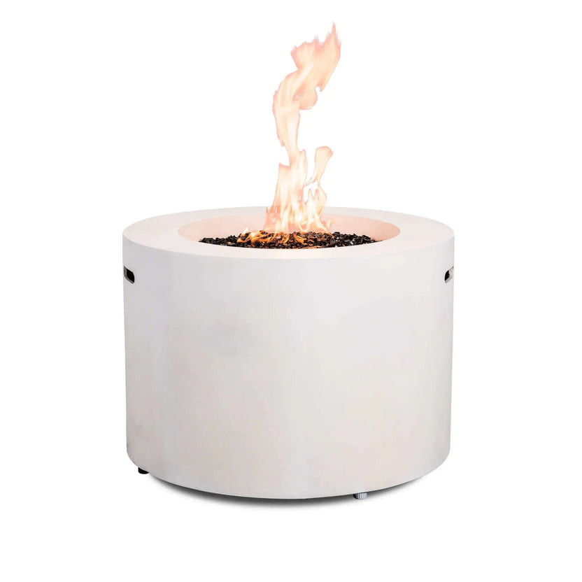 Rear view of the Flame Havens Refuge Series 36-inch Round Propane Gas GFRC Concrete Fire Pit in Ivory White with tall flames rising above premium Black Reflective Fire Glass. The clean, control-free angle emphasizes the smooth GFRC concrete finish, modern cylindrical design, and dramatic fire presentation for upscale outdoor gathering spaces.