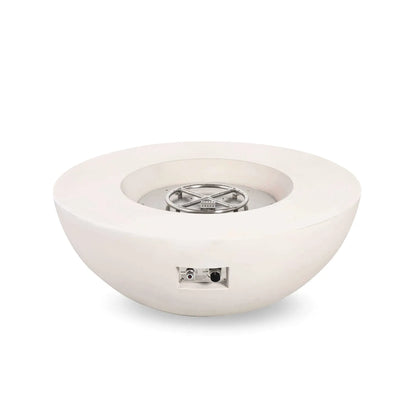 Studio image of the Flame Havens Refuge Series 43-inch Round Natural Gas White GFRC Concrete Fire Pit with the reflective fire glass removed, revealing the stainless steel burner ring, burner pan, and CSA-certified ignition assembly. The exposed components showcase the durable construction and professional-grade burner system.