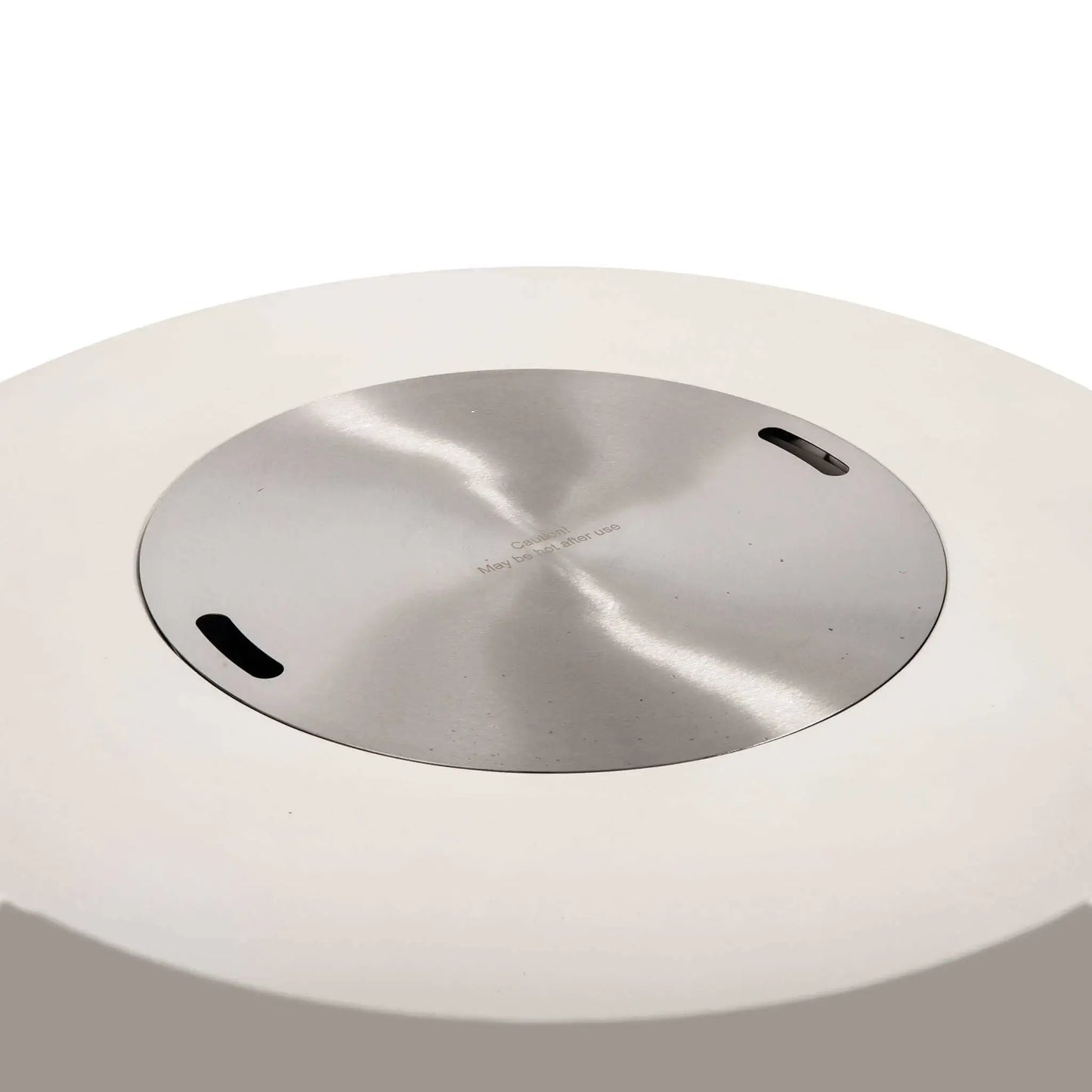 Front studio image of the Flame Havens Refuge Series 43-inch Round Natural Gas White GFRC Concrete Fire Pit with the stainless steel burner cover installed. The flush-mounted brushed stainless cover transforms the fire pit into a clean tabletop surface while concealing the burner beneath.