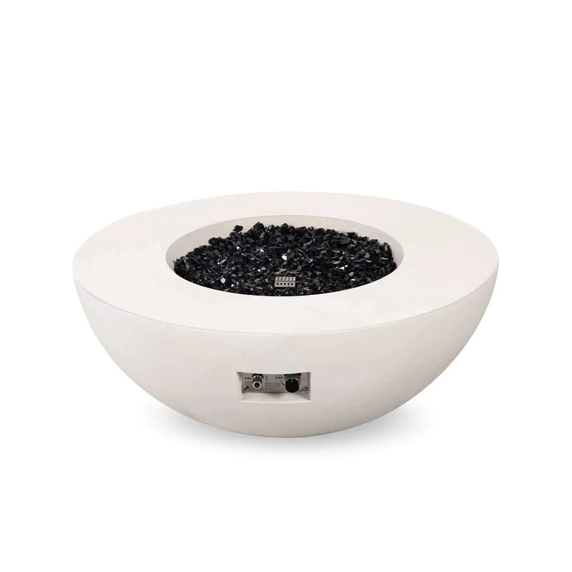 Front studio image of the Flame Havens Refuge Series 43-inch Round Natural Gas White GFRC Concrete Fire Pit filled with reflective tempered black fire glass while the burner is turned off. The recessed electronic ignition and flame control panel are visible, emphasizing the clean contemporary design and premium outdoor construction.