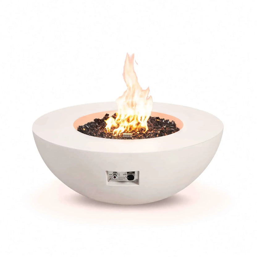 Studio front view of the Flame Havens Refuge Series 43-inch Round Natural Gas White GFRC Concrete Fire Pit burning over reflective tempered black fire glass. The recessed electronic ignition and flame control panel are visible beneath the bowl, showcasing convenient access while maintaining the fire pit's clean contemporary appearance.