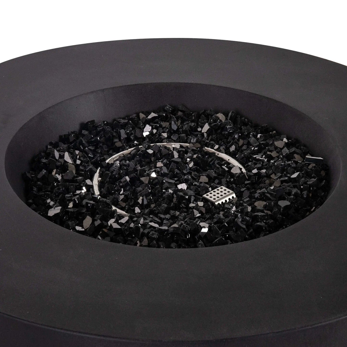 Close-up view of the Flame Havens Refuge Series 43-inch Round Propane Gas GFRC Concrete Fire Pit in Black, showcasing the premium black concrete finish, circular stainless steel burner, CSA ignition system, and 1/2-inch black reflective fire glass evenly surrounding the burner. The image highlights the clean recessed burner pan, modern round design, and high-end craftsmanship of this luxury outdoor propane fire pit.