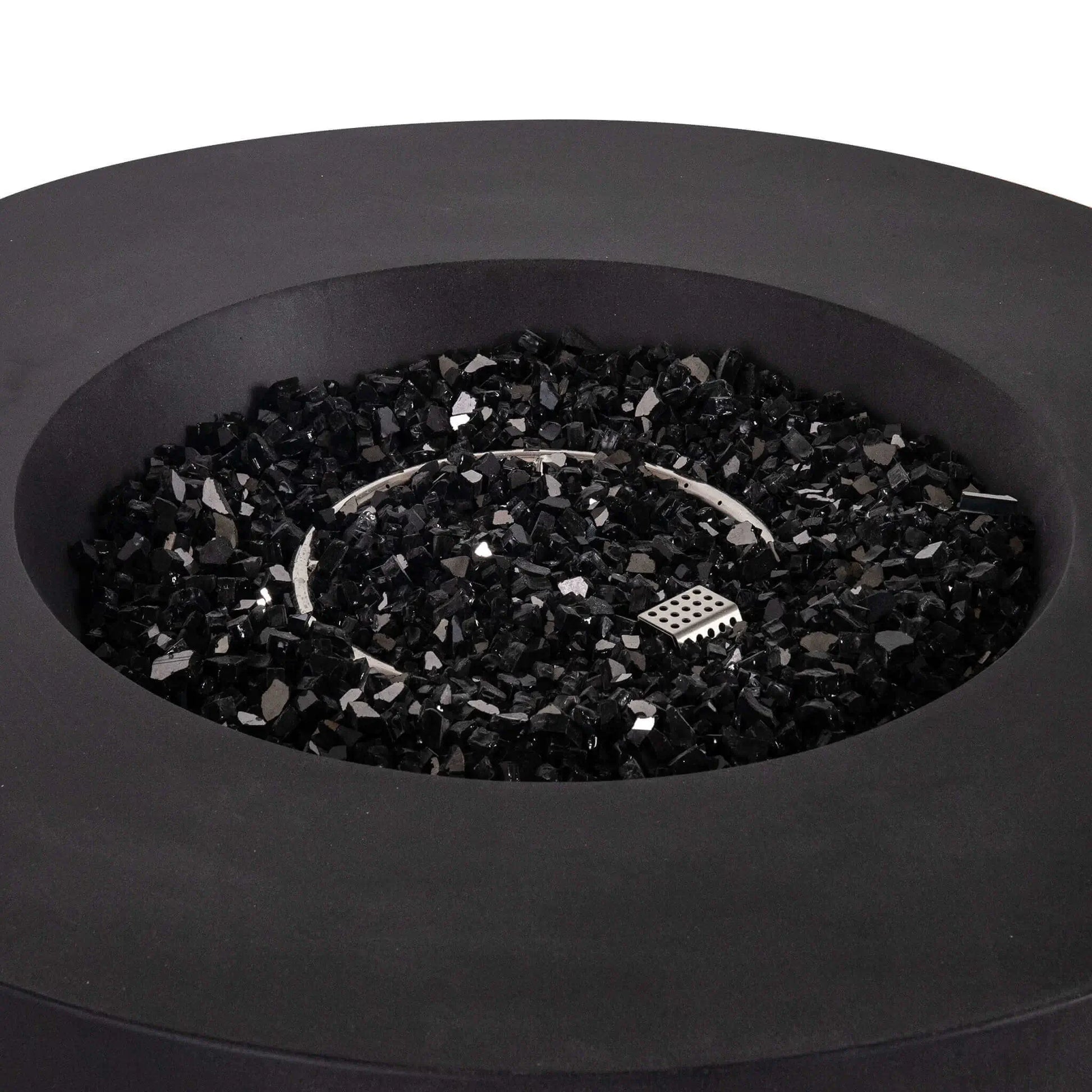Close-up view of the Flame Havens Refuge Series 43-inch Round Propane Gas GFRC Concrete Fire Pit in Black, showcasing the premium black concrete finish, circular stainless steel burner, CSA ignition system, and 1/2-inch black reflective fire glass evenly surrounding the burner. The image highlights the clean recessed burner pan, modern round design, and high-end craftsmanship of this luxury outdoor propane fire pit.