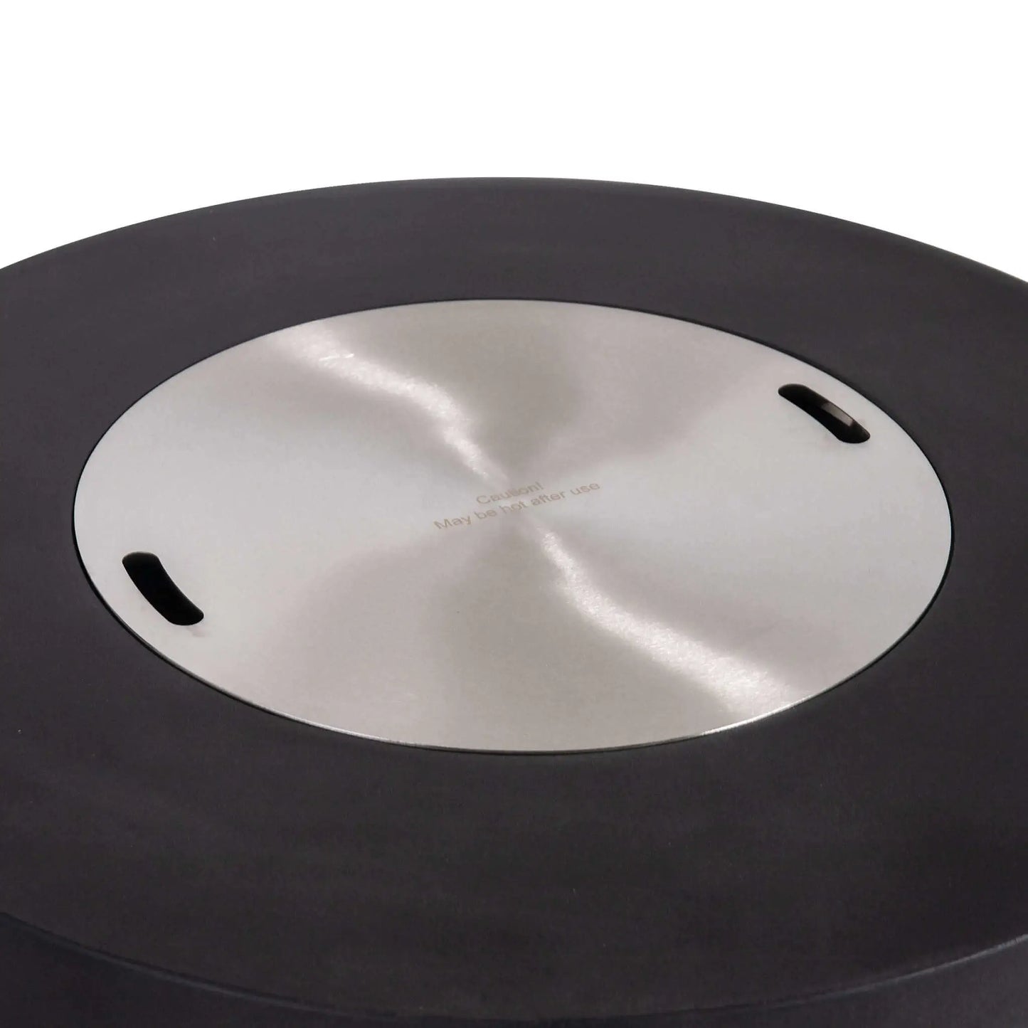 The Flame Havens Refuge Series 43-inch Round Propane Gas GFRC Concrete Fire Pit in Black featuring the optional stainless steel burner cover installed. The brushed stainless cover fits flush within the recessed burner opening, transforming the fire pit into a functional tabletop while protecting the burner. The image highlights the premium black GFRC concrete finish and clean, contemporary outdoor design.