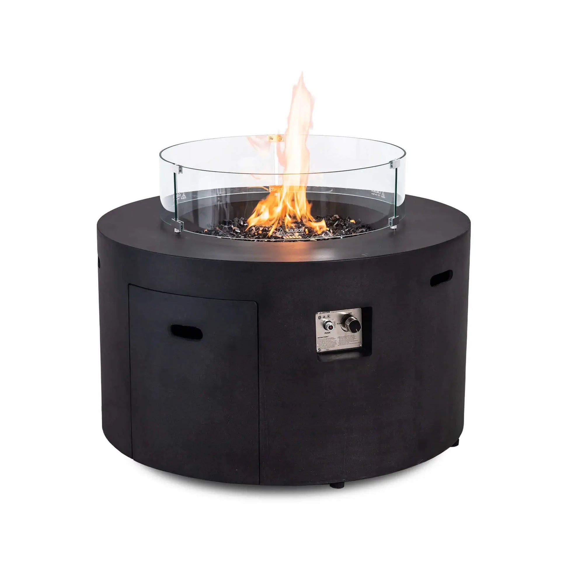 The Flame Havens Refuge Series 43-inch Round Propane Gas GFRC Concrete Fire Pit in Black burning with the optional tempered glass wind guard installed. The clear glass guard surrounds the vibrant flame above black reflective fire glass, enhancing flame stability while preserving unobstructed views of this luxury outdoor propane fire feature.