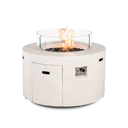 The Flame Havens Refuge Series 43-inch Round Propane Gas GFRC Concrete Fire Pit in White operating with premium tempered black reflective fire glass and the optional tempered glass wind guard installed. The image highlights the protective clear glass barrier, steady flame pattern, and contemporary round fire pit design for upscale outdoor spaces.