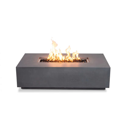 Straight-on front view of the Flame Havens Refuge Series 56 x 30 x 15 inch rectangle natural gas gray GFRC concrete fire pit burning with tall flames over reflective tempered black fire glass. This clean product image showcases the minimalist front profile without visible controls, highlighting the linear stainless steel burner and modern architectural design.
